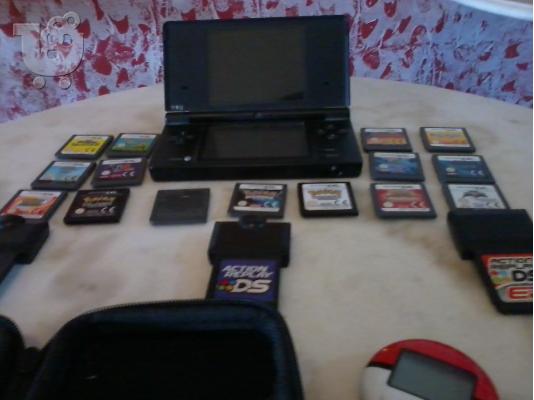 Nintendo Dsi with:Case,3 action replay,16 cards,6 card case in 150 EURW FREEEE